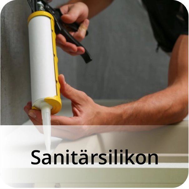 Handwerker beim Abdichten eines Waschbeckens mit Sanitärsilikon